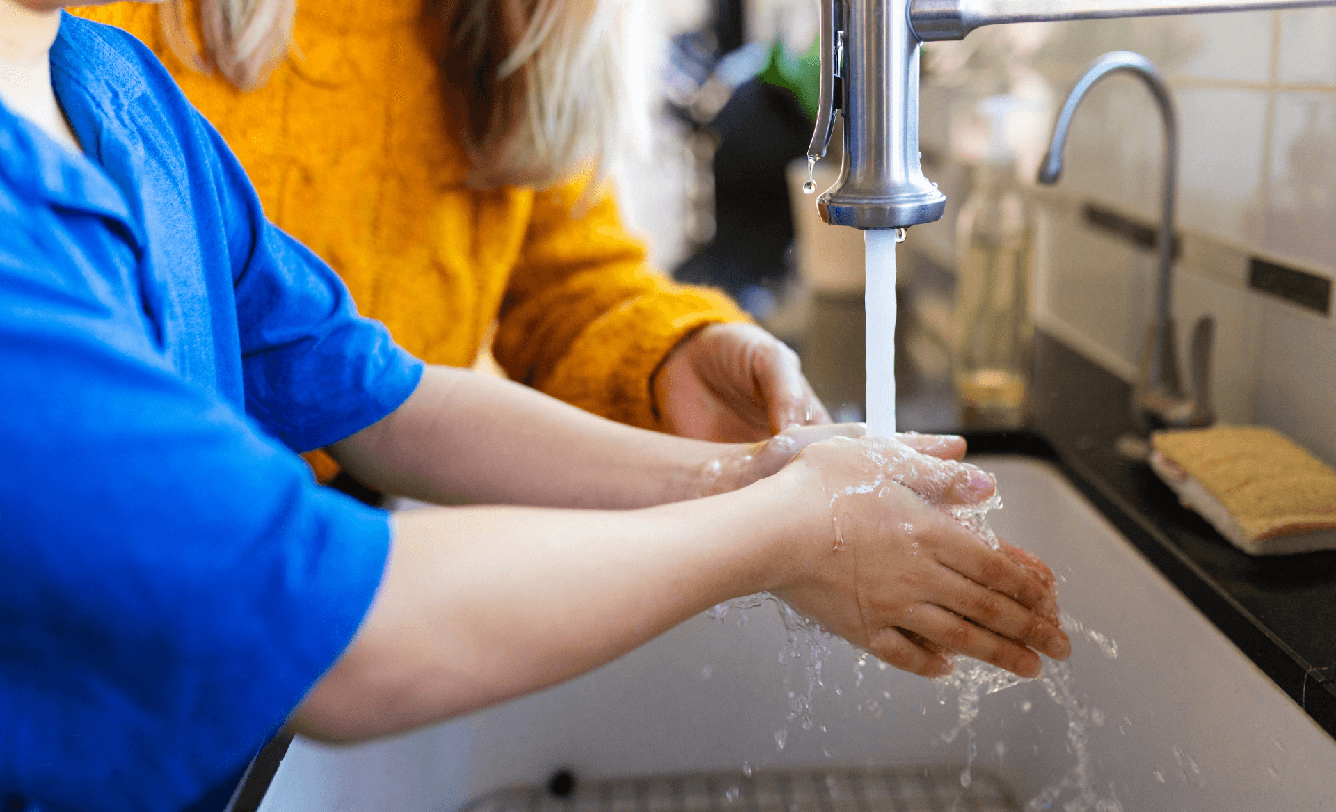 kid washing hands